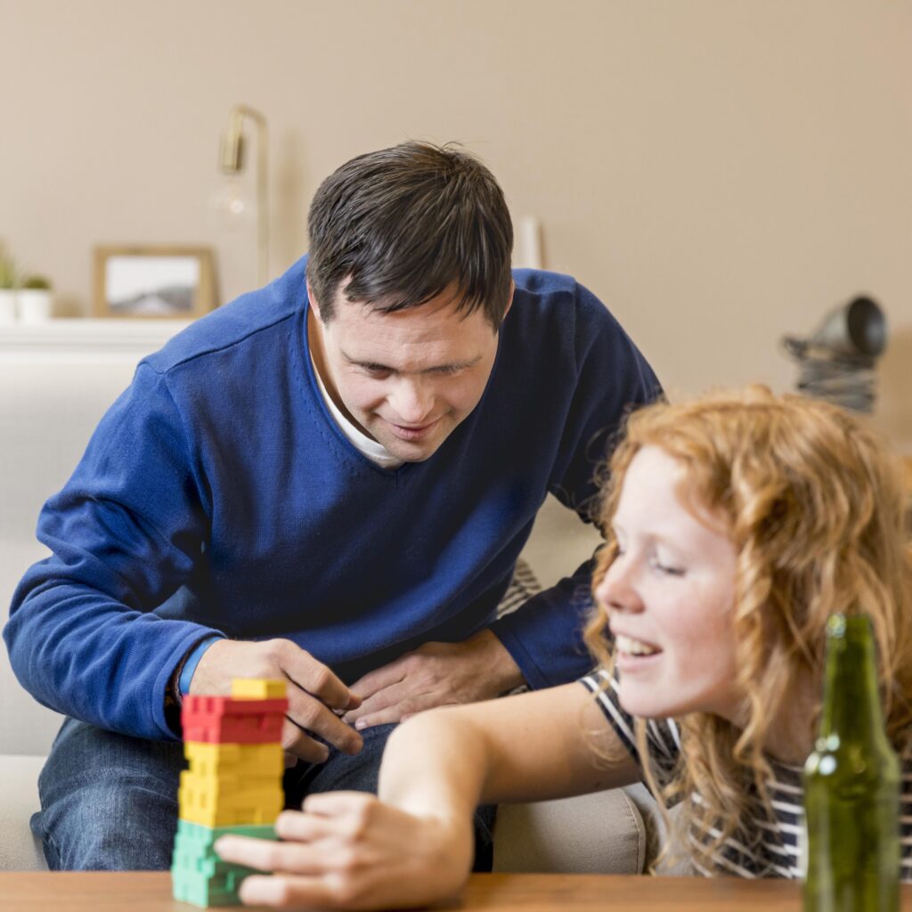 man woman playing games home
