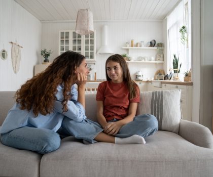 Teenage,Daughter,Sharing,Secrets,With,Young,Loving,Supportive,Mother,,Parent