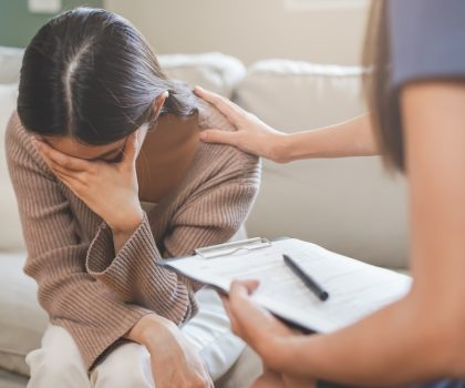 Psychology,,Sad,Asian,Young,Woman,,Girl,Cover,Face,With,Hand,