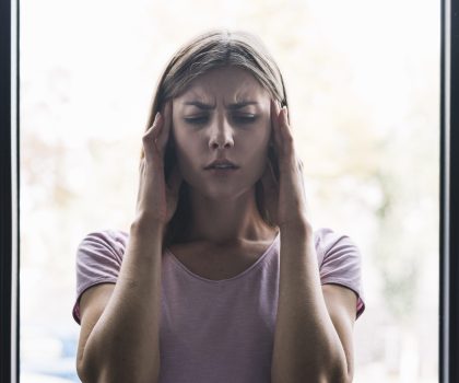 portrait-woman-suffering-from-headache